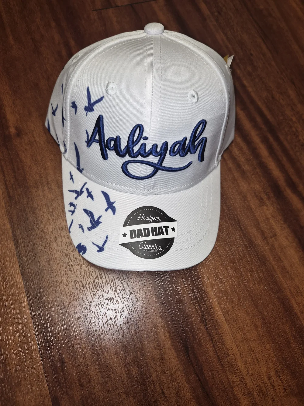 Aaliyah White Kids' Hat with Blue Script and Bird Accents